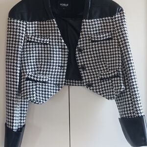 Black and white houndstooth crop jacket with faux leather detailing.